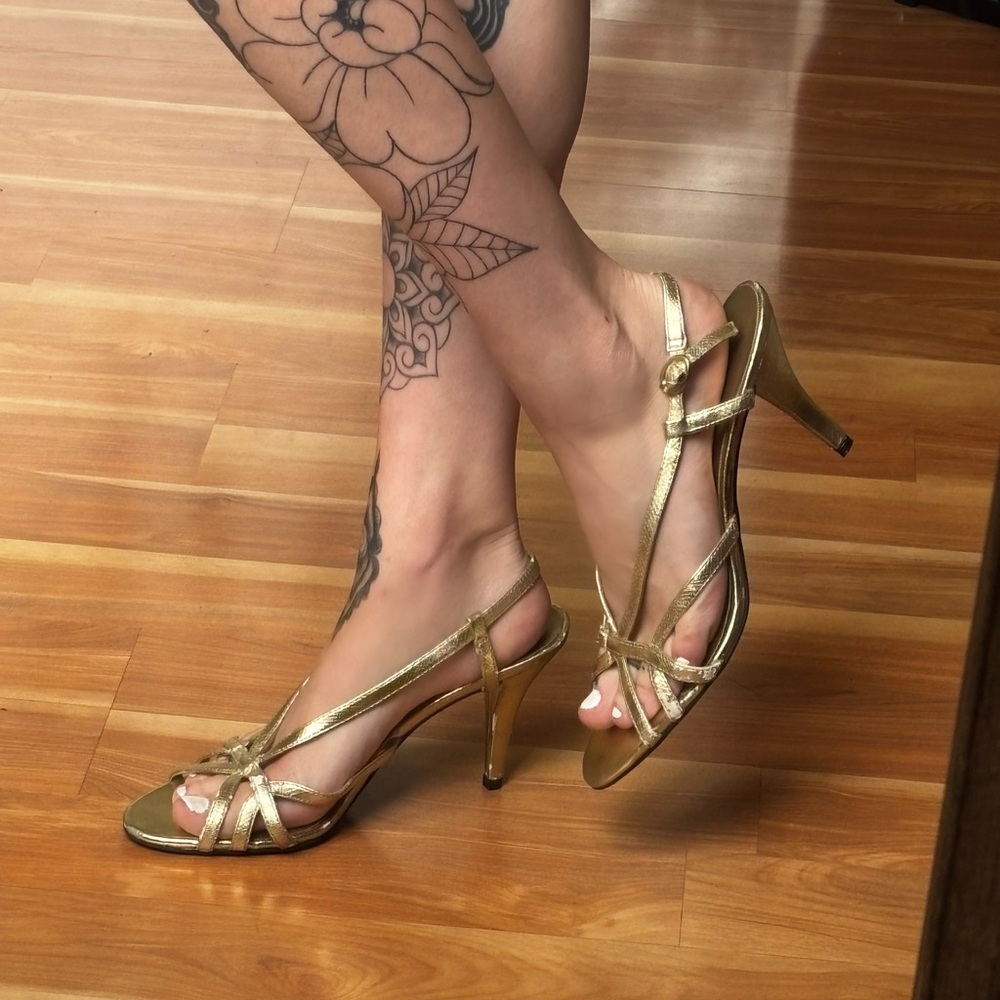 Heavily used gold kitten heels